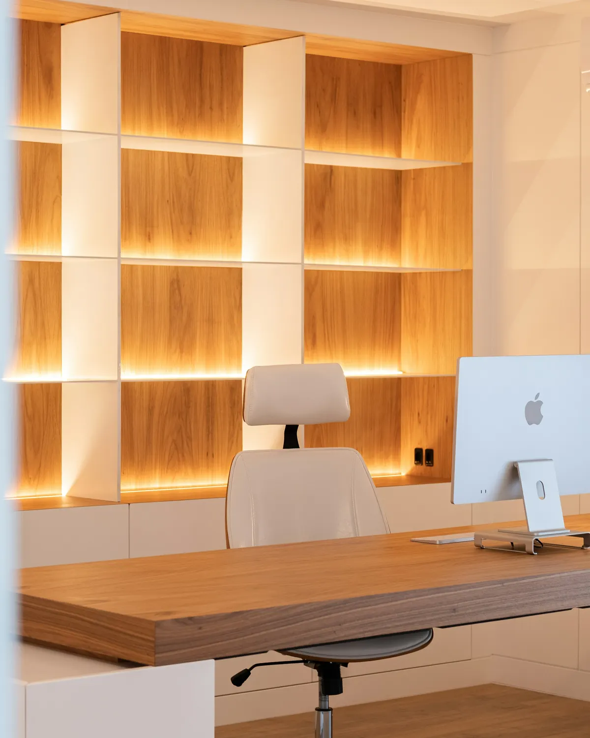 Study with illuminated oak shelving